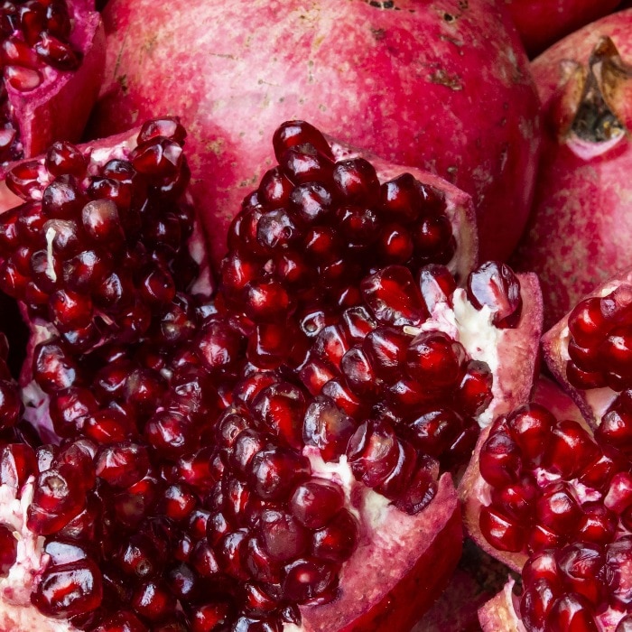 close up inside of pomegranate seeds