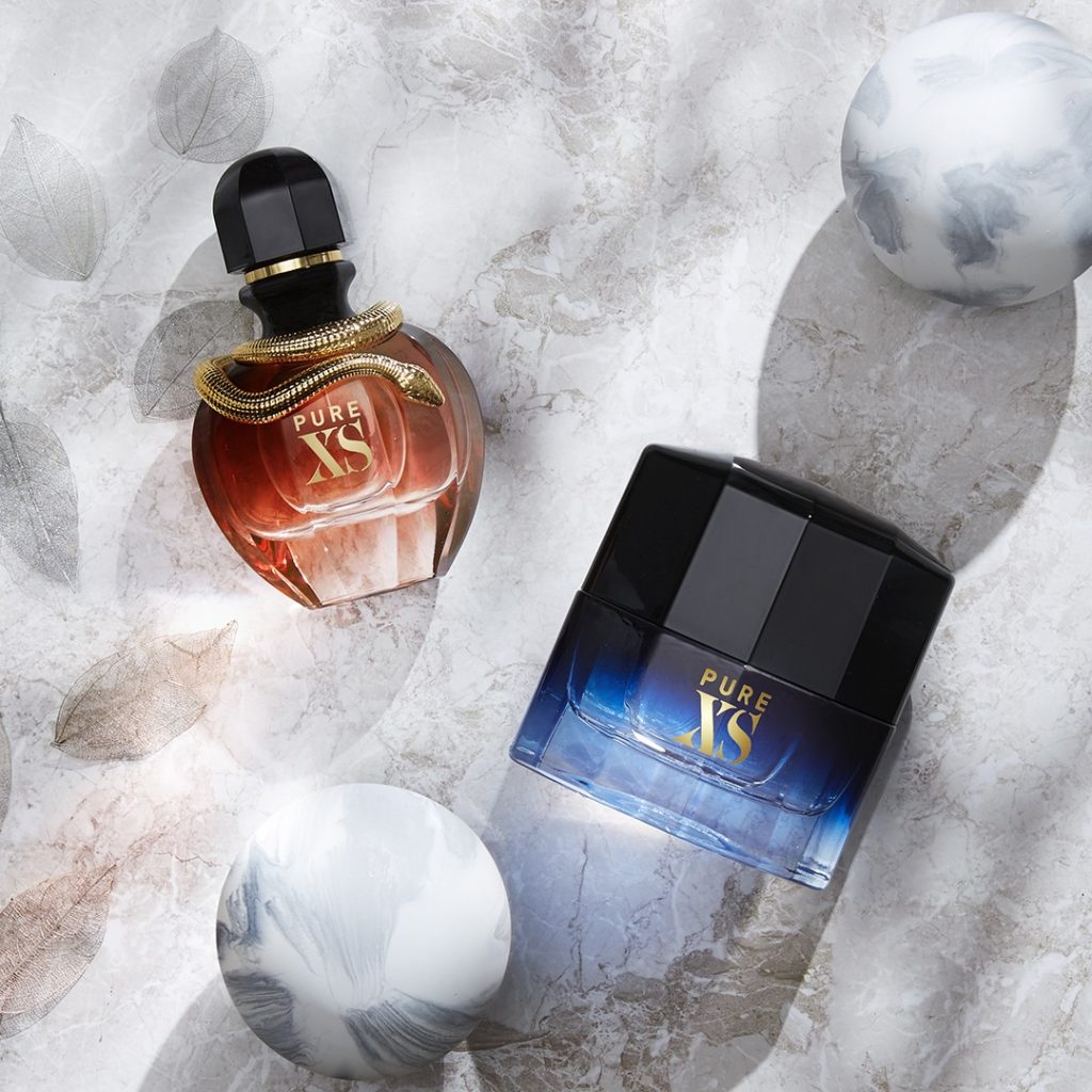 Pure XS For him and For her by Paco Rabanne marble background