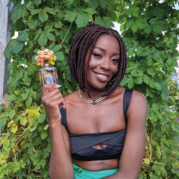 AJ Odudu Holding Daisy Ever So Fresh