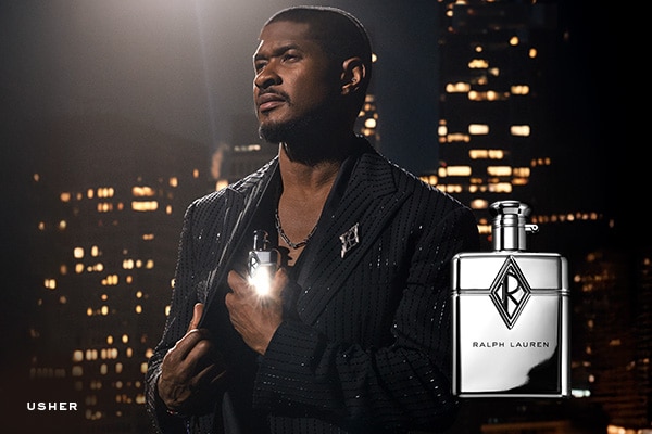 Image of Usher holding the Ralph Lauren Ralph's Club New York bottle
