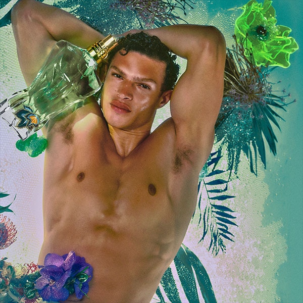 Lifestyle image of model and bottle