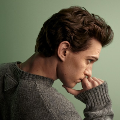 Image of Tom Holland against a green background