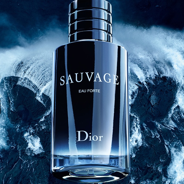 Sauvage eau forte bottle with waves in background