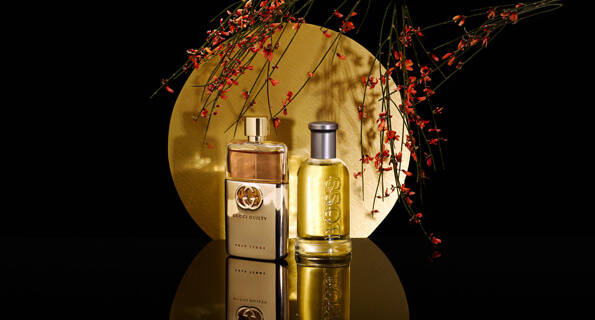 Gucci and Boss perfume bottles