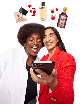 Two women using the perfume finder to find the favourite perfumes