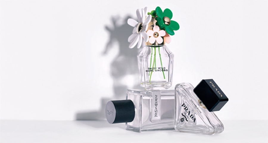 3 empty perfume bottles