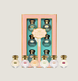 A orange box with 6 small fragrances