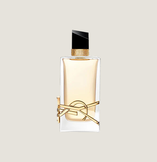 A light gold bottle with the YSL logo in gold on the bottom