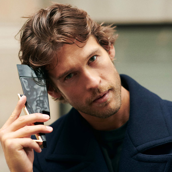 model holding bottle