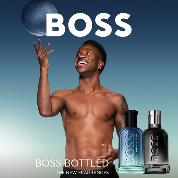 Side view of Hugo Boss Bottled Lavender fragrance bottle featuring a minimalist clear glass design, metallic silver cap and subtle lavender‑coloured liquid, highlighting the elegant and modern men’s aftershave from the Boss Bottled fragrance range.
