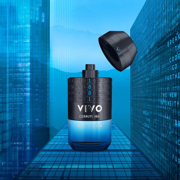 Product image of Cerruti 1881 VIVO Elixir Eau de Parfum featuring a single, bold fragrance bottle. The bottle has a dark metallic blue–anthracite cap with an engraved grid pattern and a sculpted glass body that fades from cool translucent blue at the top to warm amber at the base. The words “VIVO” and “CERRUTI 1881” are embossed on the front, set against a dark, dramatic background that highlights intensity and sophistication.