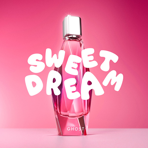 Pastel‑tinted Ghost Sweet Dreams perfume bottle against a soft, dreamy background with gentle light and cloud‑like effects.
