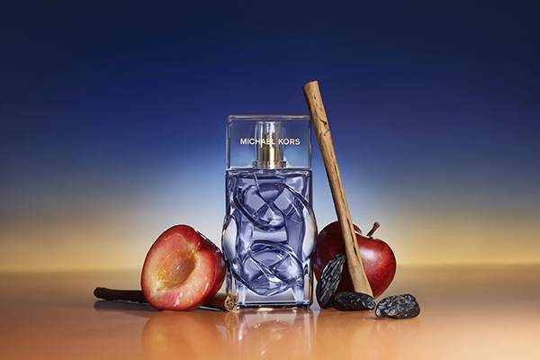 Michael Kors blue dusk with ingredients around it