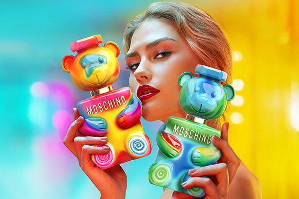 Colourful Yummy‑bear‑shaped perfume bottle from the Moschino Yummy fragrance collection.