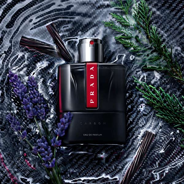 Prada Luna Rossa Carbon Eau de Toilette bottle in black with red stripe, modern men's fragrance
