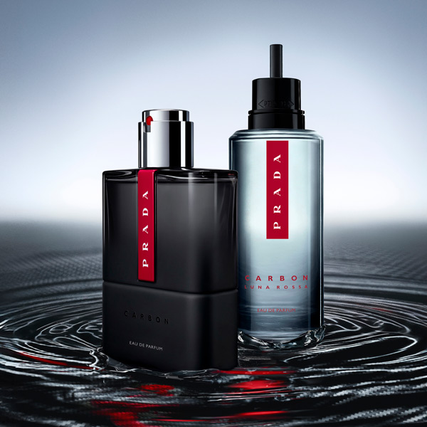Prada Luna rossa carbon bottle with refill bottle shown in water