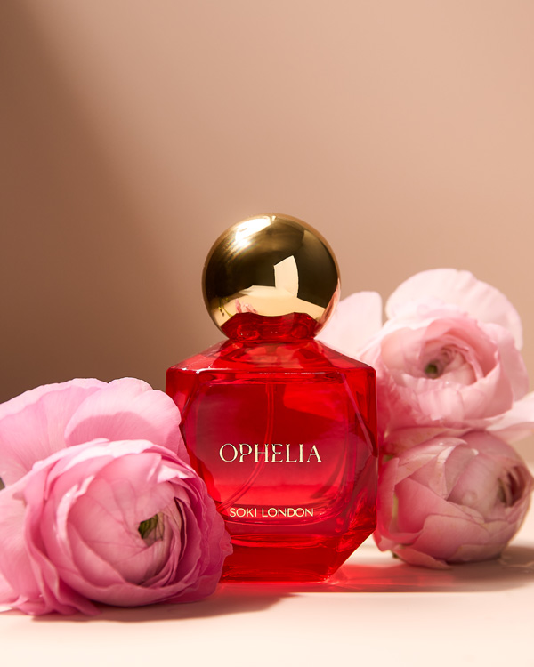 SOKI London Ophelia perfume bottle surrounded with pink flowers
